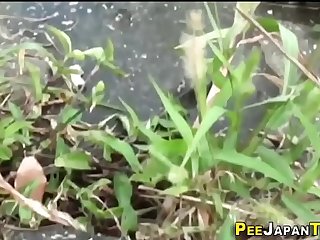 Asian teen watched peeing